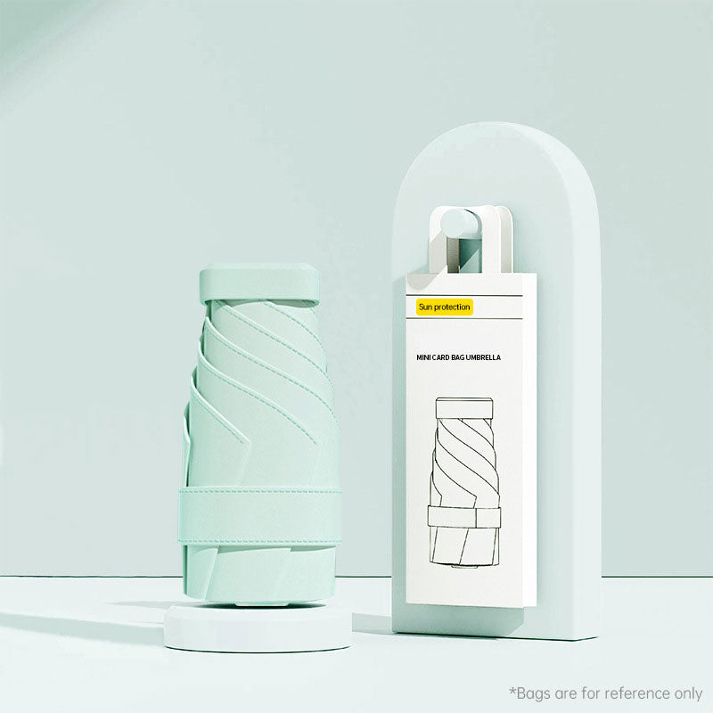 Mini Umbrella: UV Protection, Compact, Portable for Women, Pocket-sized, Folding, Ideal for Travel.