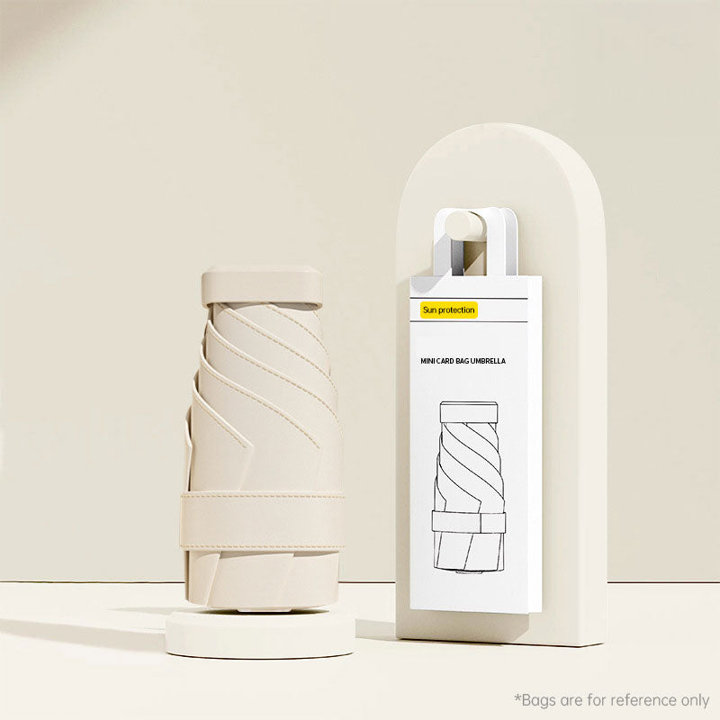 Mini Umbrella: UV Protection, Compact, Portable for Women, Pocket-sized, Folding, Ideal for Travel.