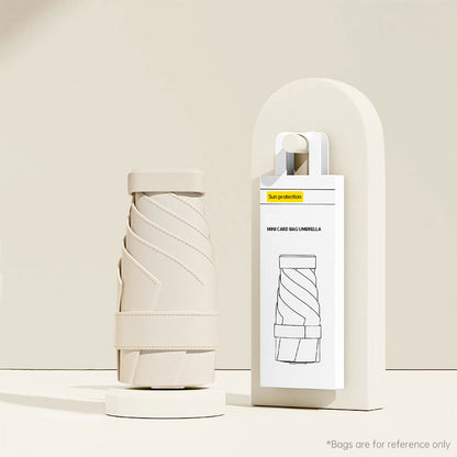 Mini Umbrella: UV Protection, Compact, Portable for Women, Pocket-sized, Folding, Ideal for Travel.